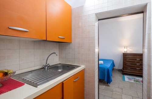 Corigliano D'Otranto Apartment | Apartment 'Panaka - Bottega Dello Speziale' with Private Terrace and Air Conditioning