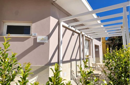 Ugento Apartment | Apartment 'L'Aurora B&B - Suite Tramonto' with Shared Terrace, Wi-Fi and Air Conditioning