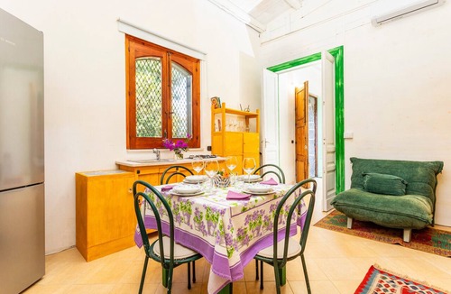 Aci San Filippo Apartment | Apartment 'La Casa Del Fico D'india - Verde' with Shared Garden, Wi-Fi and Air Conditioning