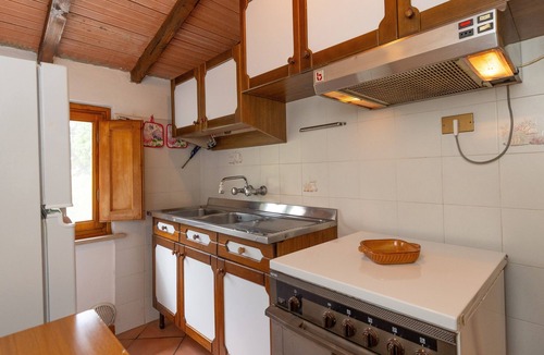Riparbella Apartment | Apartment 'Melograno' with Private Terrace, Shared Garden and Wi-Fi