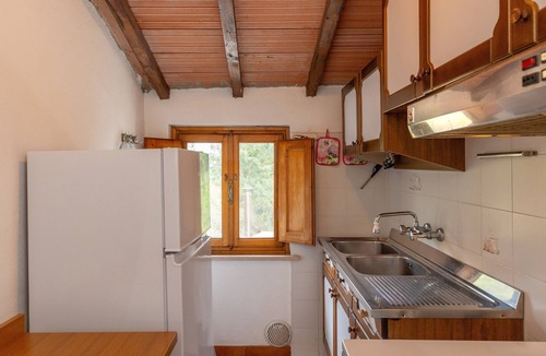 Riparbella Apartment | Apartment 'Melograno' with Private Terrace, Shared Garden and Wi-Fi