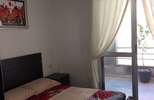Shengjin Apartment | Apartment near the beach with a beautiful view of the city and sea
