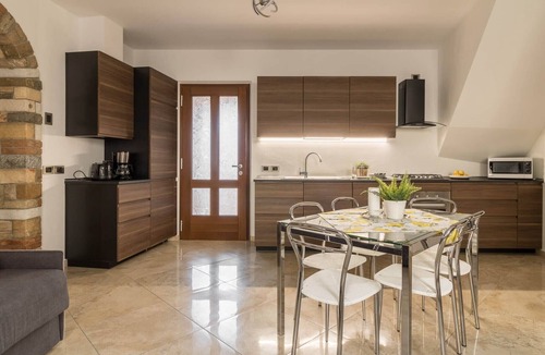 Tignale Apartment | Apartment 'Noemi' with Balcony Overlooking the Historic Center