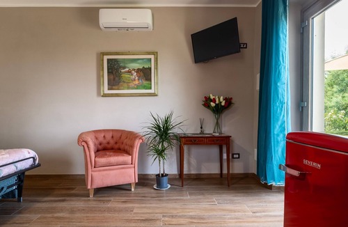 Pitigliano Apartment | Apartment 'Quercia' with Shared Garden and Air Conditioning