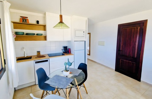 Cala Agulla Apartment | Apartment "Tramuntana" with Sea View, Pool & Wi-Fi