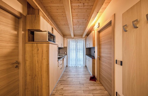 Predazzo Apartment | Apartment “Vacanze Arcobaleno - Giallo” with Mountain View, Sauna & Whirlpool