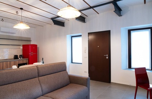 Solcio Apartment | Apartment where light meets ancient stone