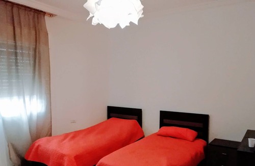 Amman Apartment | Apartment with a private terrace garden & garage