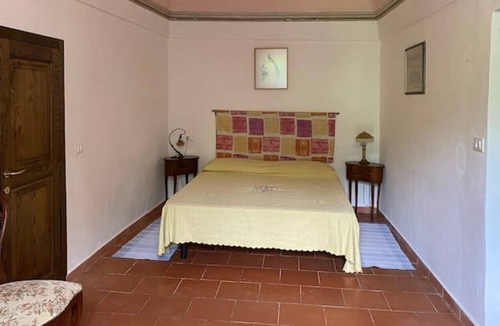 Pontremoli Apartment | Apartment with riverside terrace and relaxation area