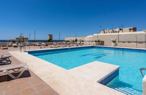 Marbella Seafront Promenade Apartment | Apartment with Shared Pool, Sea View, Wi-Fi and Air Conditioning