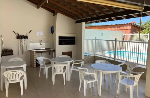 Barra de Ibiraquera Apartment | Apartment with two suites, two blocks from the sea and three from the lagoon.