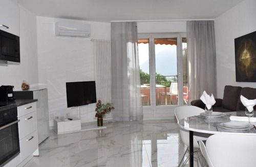 Bissone Apartment | App. 704 by Interhome