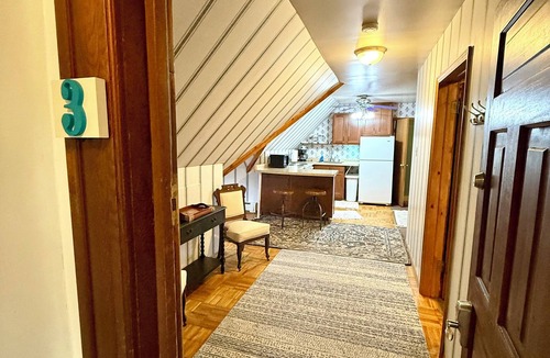 Marquette House | Apt 3 Hewitt Onion Tower attic walk up central Marquette, sauna fitness room