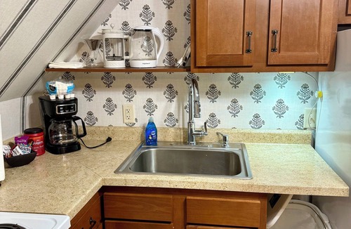 Marquette House | Apt 3 Hewitt Onion Tower attic walk up central Marquette, sauna fitness room