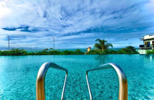 Itacolomi Apartment | Apto 3 Quartos Condomínio Resort Completo Pé na areia com Piscina borda Infinita, Beach Tennis, Academia, Sala de Jogos, Brinquedoteca, Playground e Portaria 24H , Churrasqueira Privativa Reserve Agora e Viva essa Experiência
