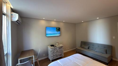 Aparecida Apartment | Apto 711 - Elegância com vista parcial da Praia