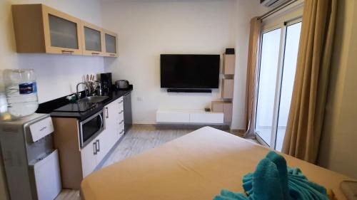 Al Ahyaa Apartment | Aqua Palms Studio A210
