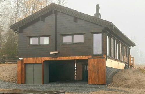 Lunner House | Architect-Designed Log Cabin By Myllavannet