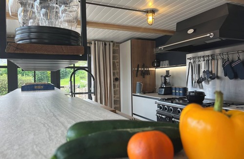 Esquibien House | Architect-designed stone house with heated pool, just ten steps from the beach