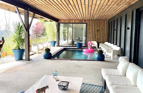 Gonneville-sur-Mer House | Architect-designed villa, year-round heated pool, 2 minutes from the sea in HOULGATE