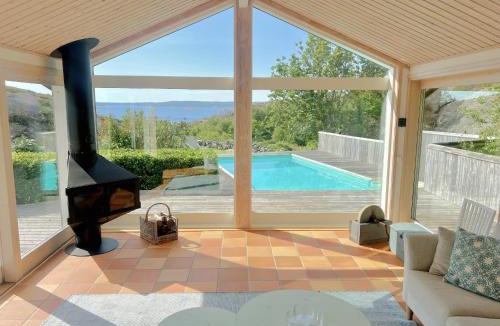 Hjaelteby House | Architect-designed villa with pool, sauna and sea view in Mjörn SE09124
