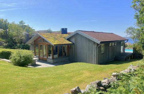 Hjaelteby House | Architect-designed villa with pool, sauna and sea view in Mjörn SE09124