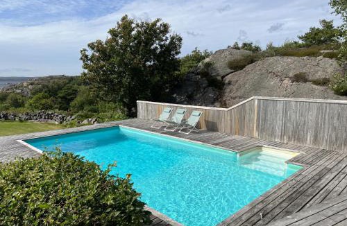 Hjaelteby House | Architect-designed villa with pool, sauna and sea view in Mjörn SE09124