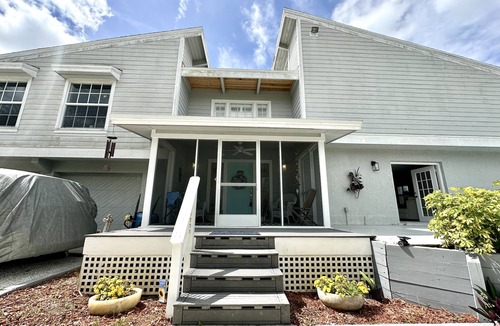 Grove City House | Architect's waterfront home is a boater's dream. Pet Friendly