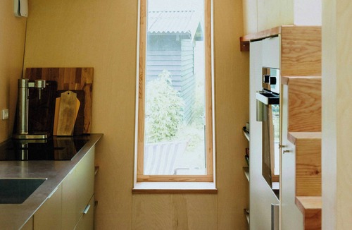 Hoeve Strand House | Architectural tiny house with sauna near beach