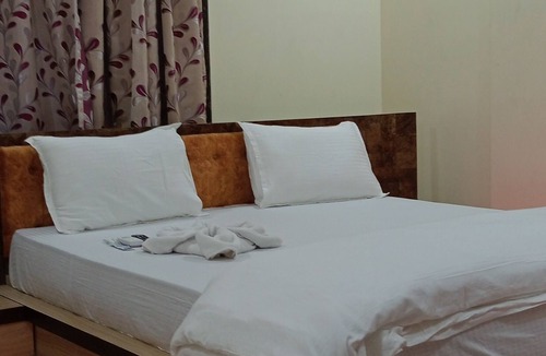 Sector II Hotel | Asha Inn