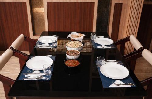 Irinjalakuda Hotel | Athirappilly Rainland Resort