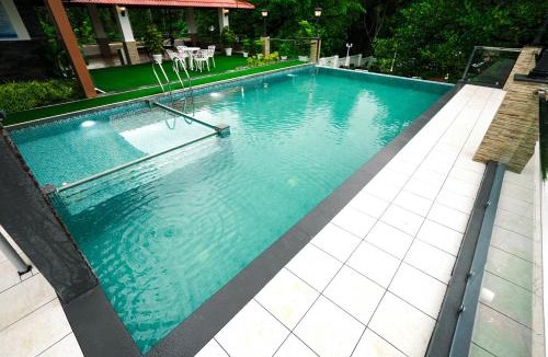Irinjalakuda Hotel | Athirappilly Rainland Resort