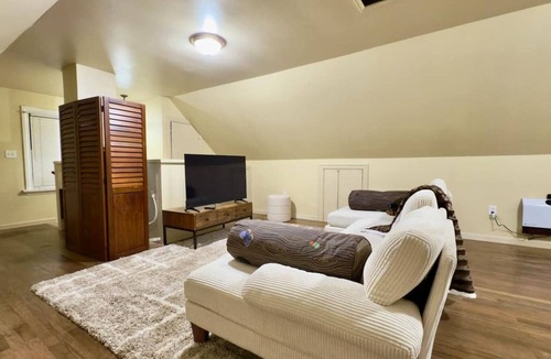 Northwest Olympia House | Attic Adventure! Two bedroom home plus full upstairs adventurous attic with two twin beds, couch and smart tv. Walk to Olympia's Downtown & Waterfront