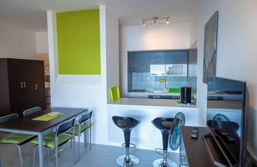 Susello Apartment | Attractive 2-room apartment with sunbath, pool and dream view