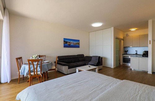Susello Apartment | Attractive studio with balcony, pool and dream view