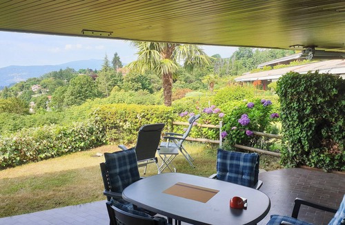 Susello Apartment | Attractive studio with terrace, garden, air conditioning, pool and dream lake view
