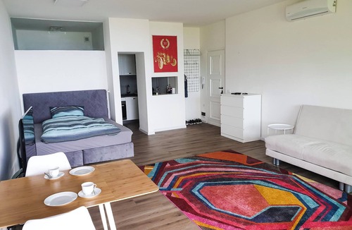 Susello Apartment | Attractive studio with terrace, garden, air conditioning, pool and dream lake view