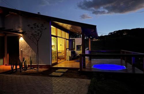 Paraisopolis House | Aura dos Ipês