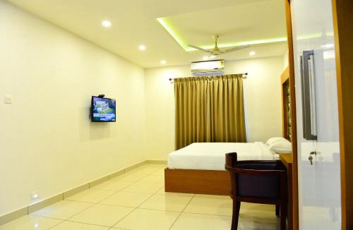 Payyanur Hotel | AURA RESIDENCY