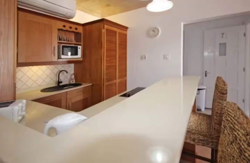 Mullins Condo | Aurora Tropical
