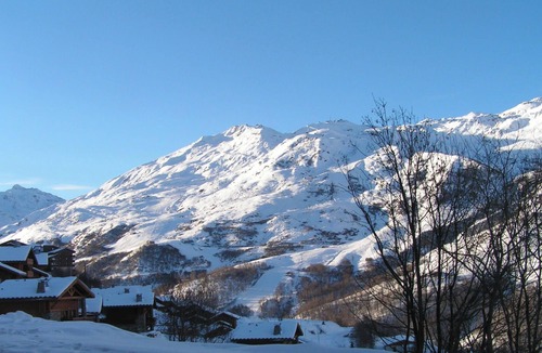 Les Menuires Apartment | Authentic apartment at the foot of the slopes, 180° view of La Masse