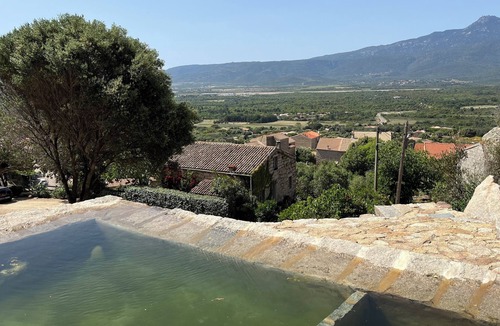 Figari House | Authentic Corsican house with swimming pool & panoramic view of the Cagna mountain range.