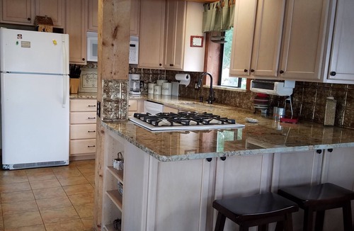 Pagosa Springs Cabin | Authentic lakefront log cabin with mountian views. Ice off! Come fishing!