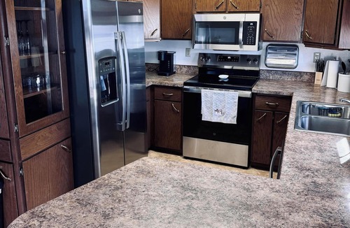 Spearfish House | Authentic Spearfish Home 1 Block from Black Hills State- Sleeps 8