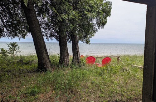 Sturgeon Bay Cottage | Authentic Waterfront Log Cottage On Sand Beach