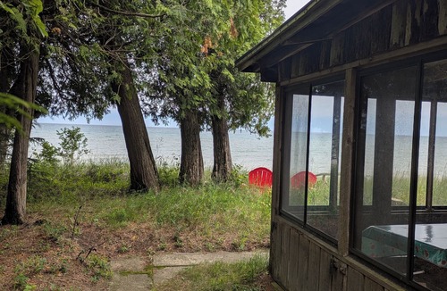Sturgeon Bay Cottage | Authentic Waterfront Log Cottage On Sand Beach