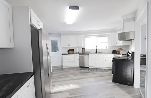 Mount Morris Township House | AVIATOR CIRCLE, A UNIQUE CIRCULAR HOME ON A QUIET AIRSTRIP IN FLUSHING, MI