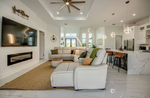 Pelican Villa | Awesome 4 BR/3 bath waterfront villa w. heated pool, hot tub, kayaks, fishing poles, bikes