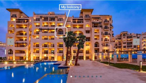 Village Road Apartment | Awesome Pool View Studio in Al Dau Heights