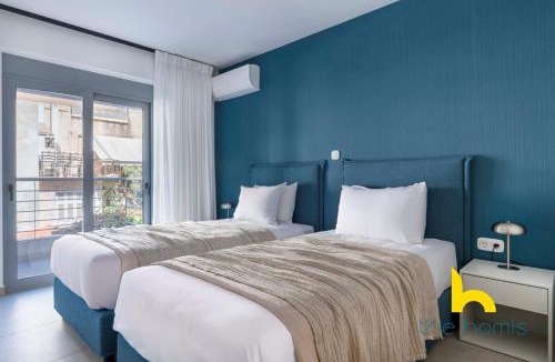 Kinosargous Apartment | B1 Bright 2BR Haven w Balcony, Kingbed & Parking!